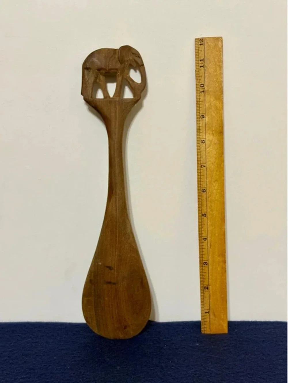 vintage hand-carved wooden serving spoon, carved elephant handle